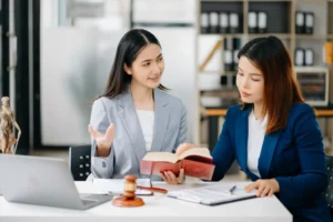 asian-business-team-and-lawyers-discussing